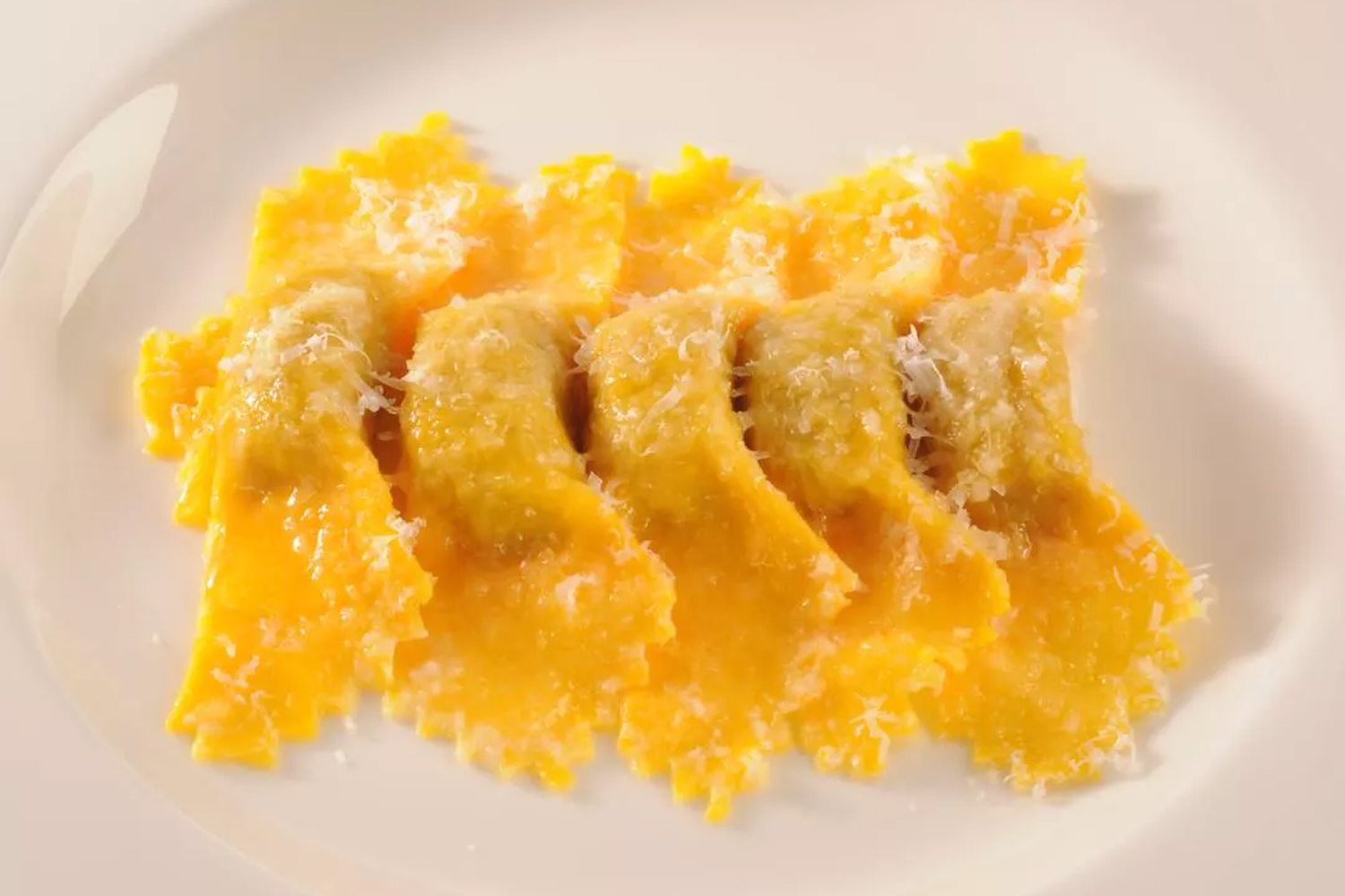 Tortelli zucca, di Nadia e Giovanni Santini, ristorante Dal Pescatore Guida Michelin